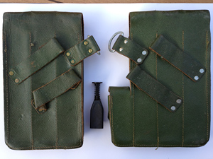 A Norwegian MP40 pouch set (back) including the Norwegain magazin loader