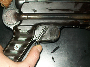 Winter trigger installed on MP40 (right view) trigger pulled