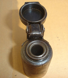Hinged metal muzzle cap (front open)